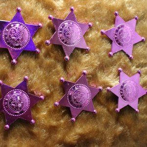 6 purple/pink plastic sheriff badges they cute,